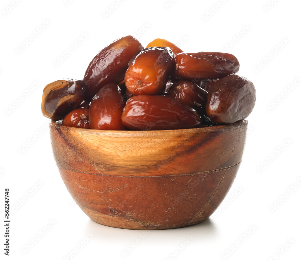 Bowl with dried dates for Ramadan on white background