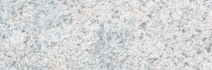 Wall Mural - Granite texture. Natural gray granite with a grainy pattern. Stone background. Solid rough surface of rock. Durable construction and decoration material. Close-up.
