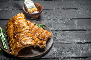 Canvas Print - Grilled ribs with sauce.