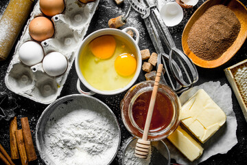 Wall Mural - Baking background. Flour and various ingredients for dough.