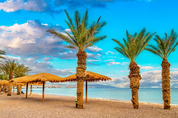 Wall Mural - Morning on central public beach of the Red Sea in Eilat - famous tourist resort and recreational city in Israel