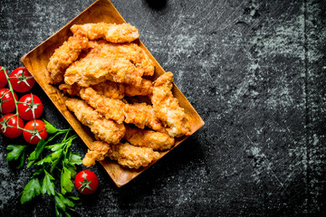 Poster - Chicken strips with parsley and cherry tomatoes.