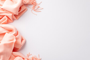 Wall Mural - Hello spring concept. Top view photo of pink scarf on isolated white background with copyspace