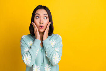 Poster - Photo of astonished cute lovely lady wear stylish outfit look empty space profitable offer buy clothes isolated on yellow color background