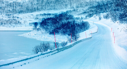 Wall Mural - Beautiful winter landscape with snow and ice covered road - Tromso, Norway - Arctic landscape