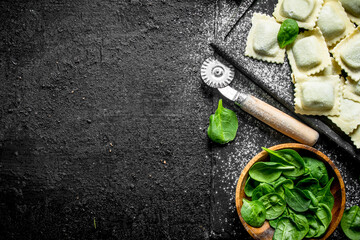 Canvas Print - Italian Ravioli raw with greens.