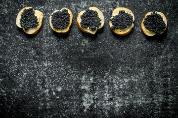 Poster - Sandwiches with black caviar.