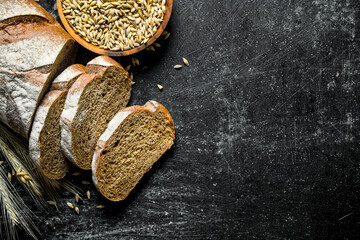 Wall Mural - Pieces of fresh bread with grain.