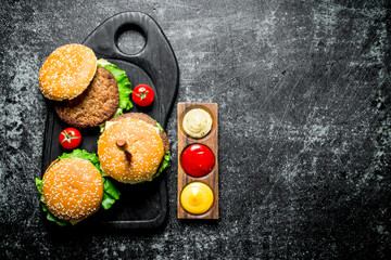 Sticker - Burgers with salad leaves,tomatoes and sauces.