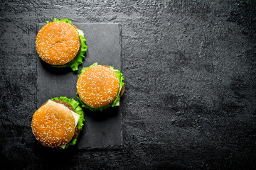 Poster - Burgers with beef,vegetables and cheese.