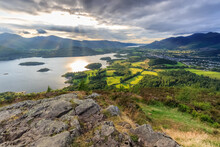 View From Walla Crag As The Sun Rays Shine Down On Derwentwater In Cumbria