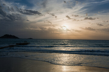 Cloudy and windy weather with large waves at the  beach in Arillas, north Corfu island, Greece