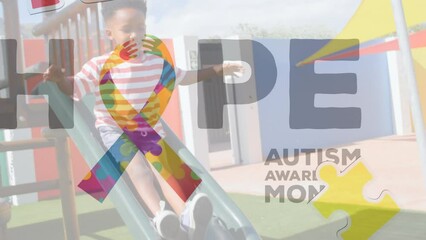 Poster - Animation of puzzle pieces and autism awareness month text over african american boy