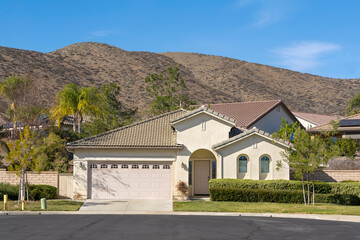 Suburban one level single family home exterior view in a sunny day, Menifee, California, USA