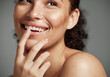© K. A./peopleimages.com - Woman, sugar scrub and lips with smile for skincare, makeup or cosmetics against a grey studio background. Happy female smiling in happiness for facial cosmetic, lip dermatology or mouth exfoliation