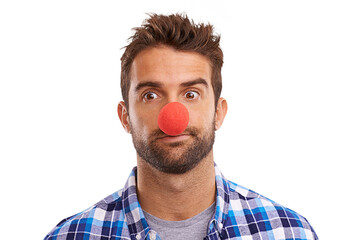 Wall Mural - A studio shot of a handsome man wearing a red nose Isolated on a PNG background.