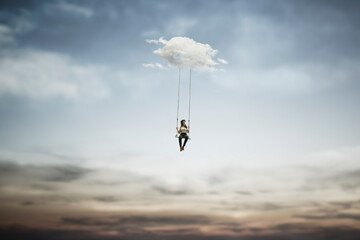 surreal woman having fun on a swing hanging from a cloud, abstract concept