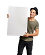 © peopleimages.com - A handsome young man holding a placard Isolated on a PNG background.