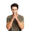 © peopleimages.com - A handsome young man standing with his hands together in a hopeful gesture Isolated on a PNG background.