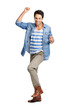 © peopleimages.com - A handsome young man punching the air in excitement Isolated on a PNG background.
