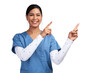 © peopleimages.com - Portrait of a young doctor wearing scrubs and pointing to her left Isolated on a PNG background.