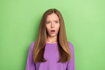 Wall Mural - Photo of stressed depressed lady wear trendy clothes worried weird news isolated on green color background