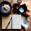 © FrankBoston - recipe book surrounded by food ingredients with lots of copy space, generative AI