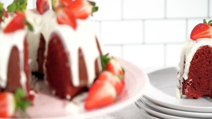 Sticker - Step by step. Slicing red velvet bundt cake with cream cheese frosting garnished with fresh strawberries.