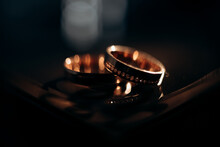 Wedding Rings On A Black Background