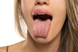 © vladimirfloyd - Front view of a woman tongue