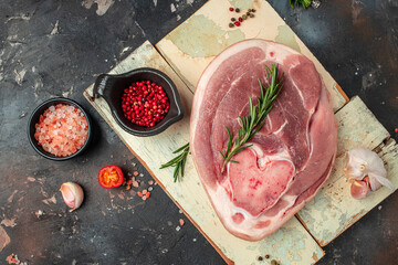 Wall Mural - pork meat on a wooden board, food recipe background. close up