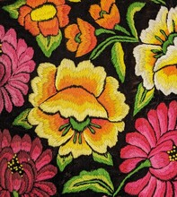 Mexican Traditional Embroidery In Yellow, Pink, Orange And Green On Black Background. Flowers And Leaves