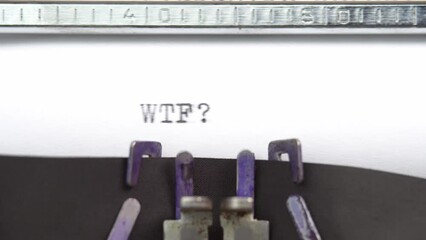 Leinwandbilder - WTF what the fuck word close up being typing and centered on a sheet of paper on old vintage typewriter mechanical