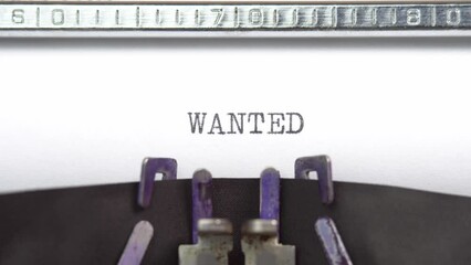 Leinwandbilder - Wanted word closeup being typing and centered on a sheet of paper on old vintage typewriter mechanical