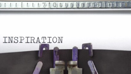 Leinwandbilder - Inspiration word closeup being typing and centered on a sheet of paper on old vintage typewriter mechanical