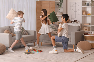 Poster - Happy little friends fighting pillows at home