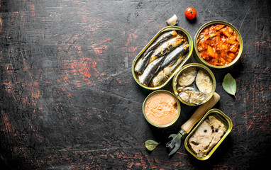 Poster - Assortment of canned food in open aluminum cans.