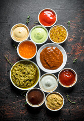 Poster - Barbecue sauce, pesto, mayonnaise, mustard with thyme sprigs.