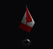 Small National Flag Of The Canada On A Black Background