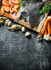 Poster - Flounder fish on tray with crab, shrimp and oysters.