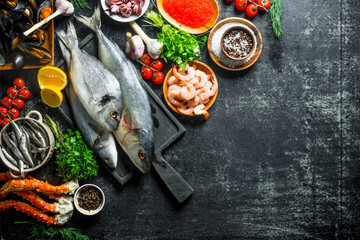 Canvas Print - Fresh fish with shrimp, crab and herbs.