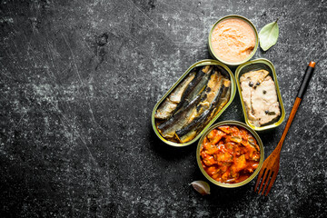 Sticker - Canned fish in tin cans.