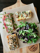 © Cavan Images - Deliciously looking pizza slices with a fresh salad.