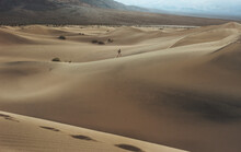 Runner On Dunes In Death Valley Ca