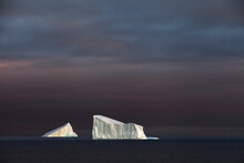 Floating Icebergs In Antarctic Sound At Sunset, Antarctica.
