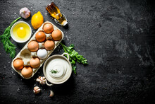 Mayonnaise With Eggs, Oil, Herbs And Garlic Cloves.