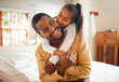 © K. A./peopleimages.com - Family, child hug father with love and care at home, happiness with relationship, trust and affection. Black man, young girl smile and happy people with embrace, wellness with bonding together