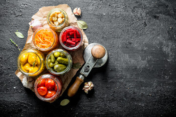 Poster - Jars of preserved vegetables on paper.