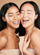 © J Maas/peopleimages.com - Beauty, skincare and diversity of different women in studio for dermatology, makeup and cosmetics. Asian and black person together for skin glow, spa facial and healthy body of friends for wellness