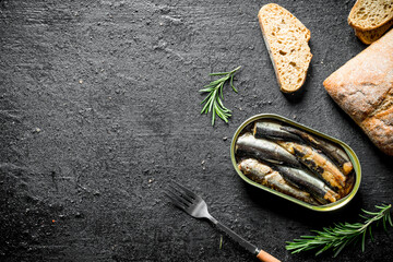 Sticker - Sprats with slices of bread and rosemary.